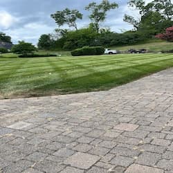 Mowing lawn stripes in a luxury Lawn luxury Lawn with a checkerboard pattern